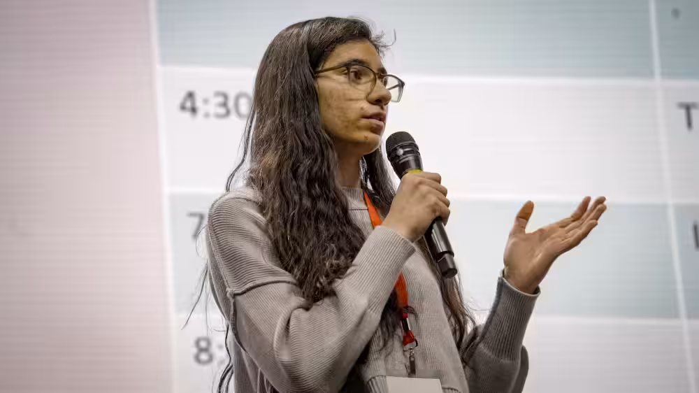 An image of a student presenting at TechOlympics 2025: Inspire.